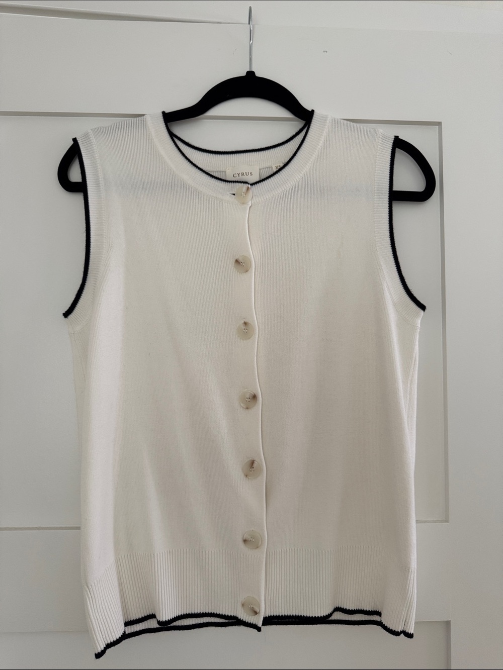 Cyrus White Sleeveless Button-Front Knit Top with Black Trim